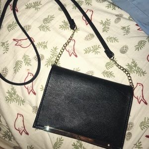 INC long black and gold cross body bag